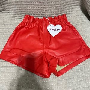 Red leather shorts